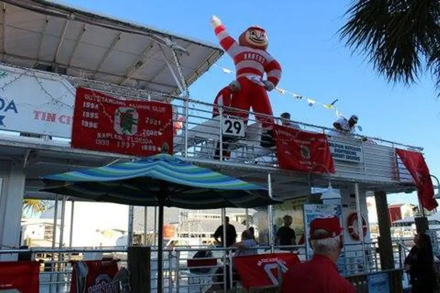 Brutus Buckeye riding on the club's boat