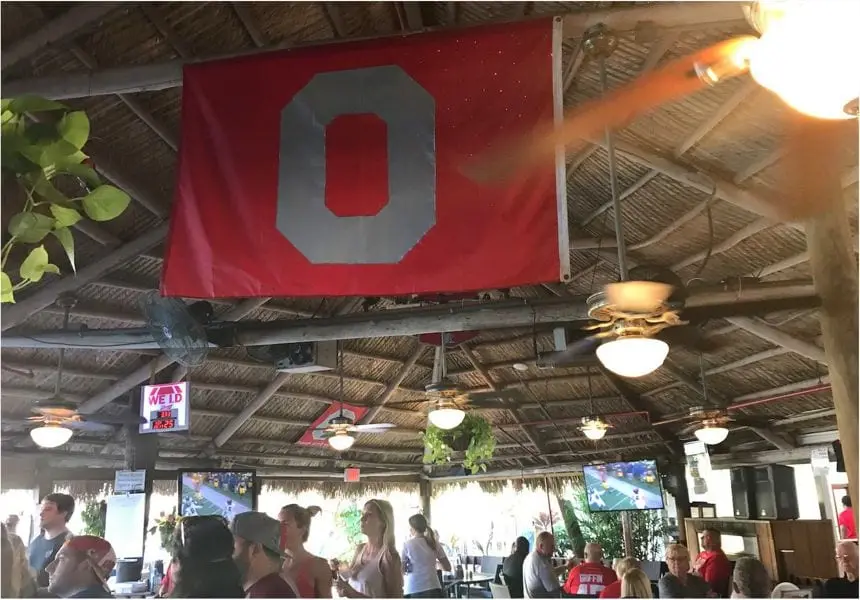 The Block O flag hanging over the bar at Harold's Place
